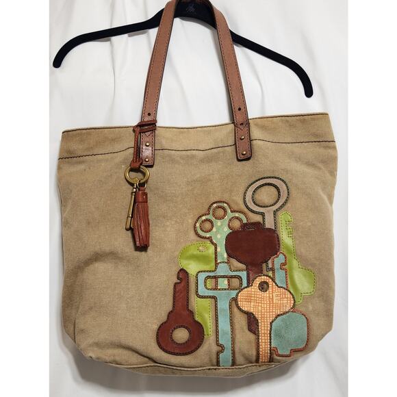 Fossil Handbags - FOSSIL Large Jules Key Tote Tan Canvas Leather Handles Brass Key Tassel